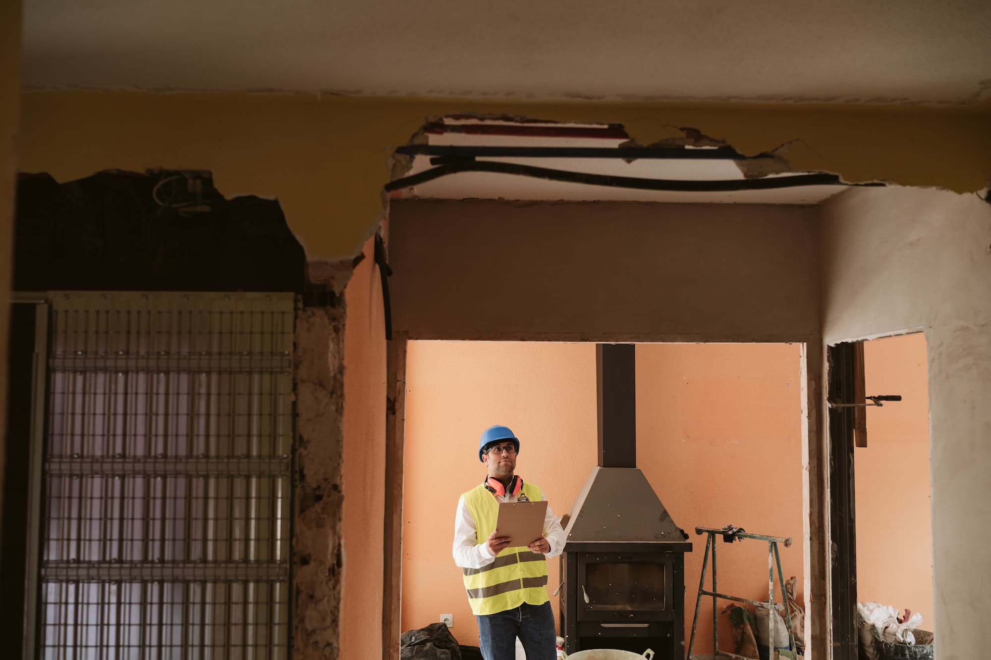 https://gulfcoastmitigators.com/wp-content/uploads/2024/04/foreman-or-architect-working-on-mobile-phone-bluep-2023-11-27-05-11-34-utc-1.jpg